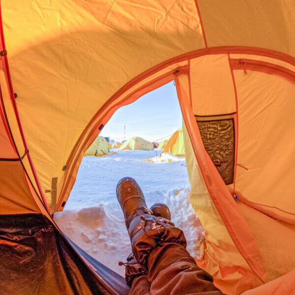 Lying inside a tent in Antarctica.